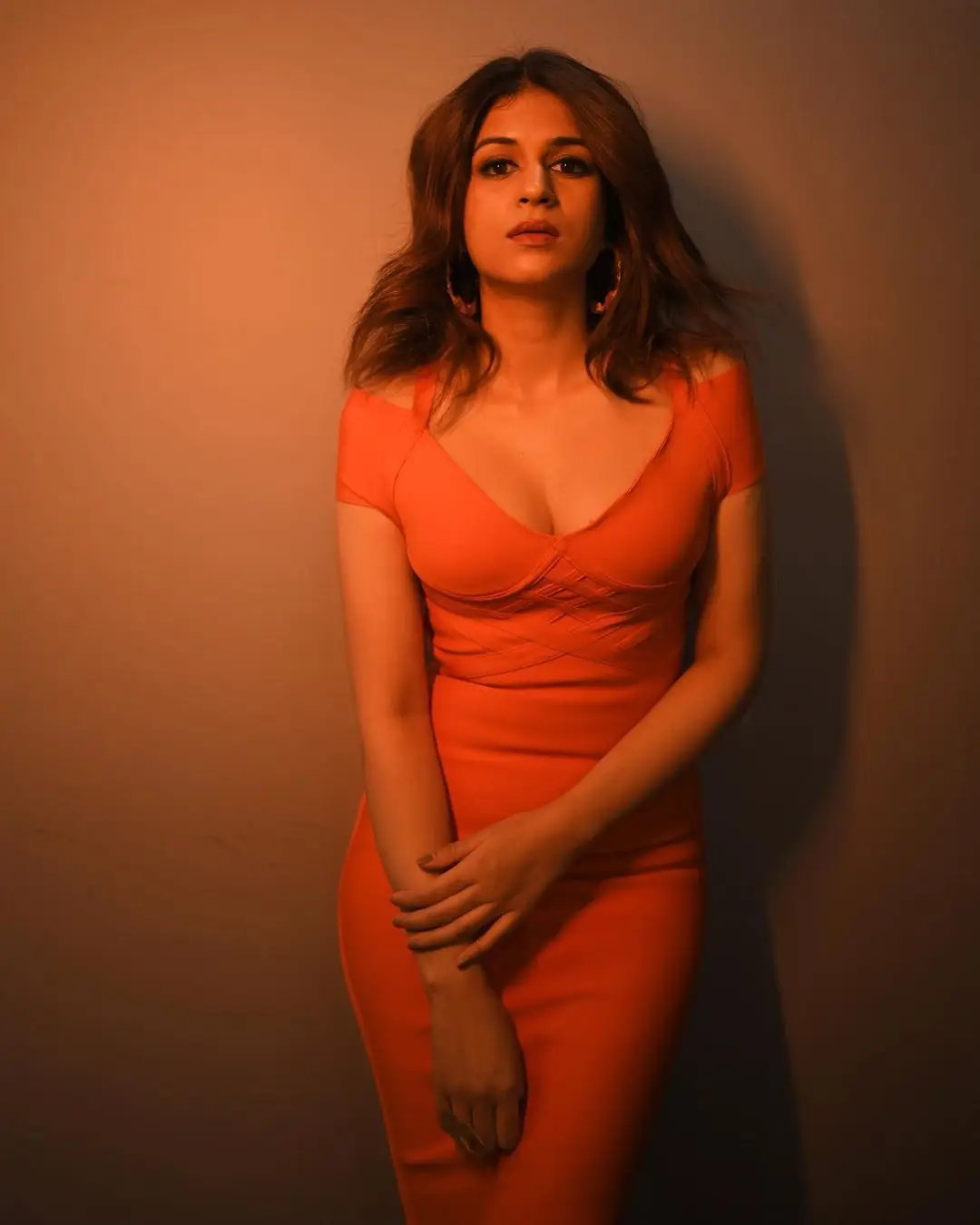 Shraddha Das Long Legs Show in Orange Mini Skirt